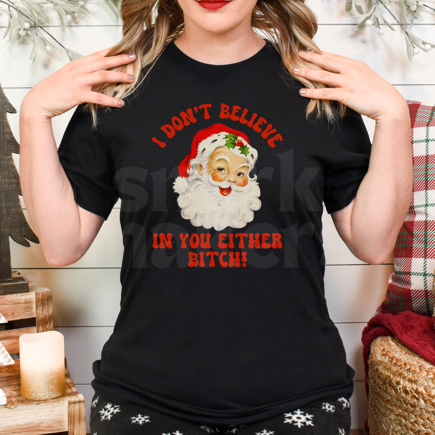"I don't believe in you either bitch" funny Christmas tee in black.