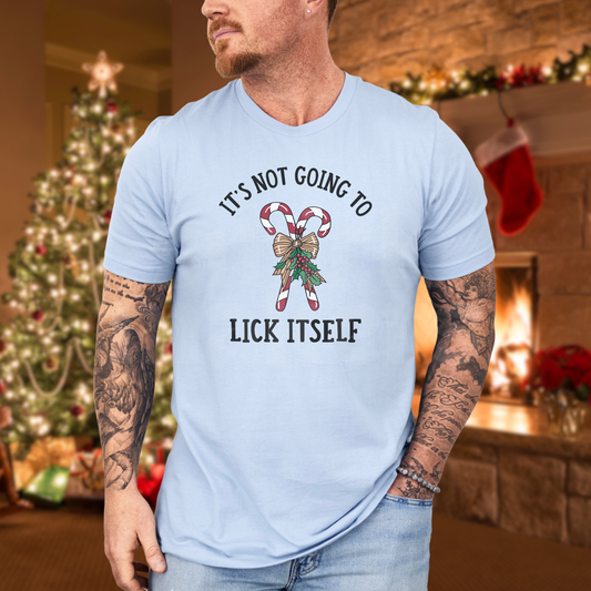 "It's not going to lick itself"- funny Christmas candy cane tee in baby blue.