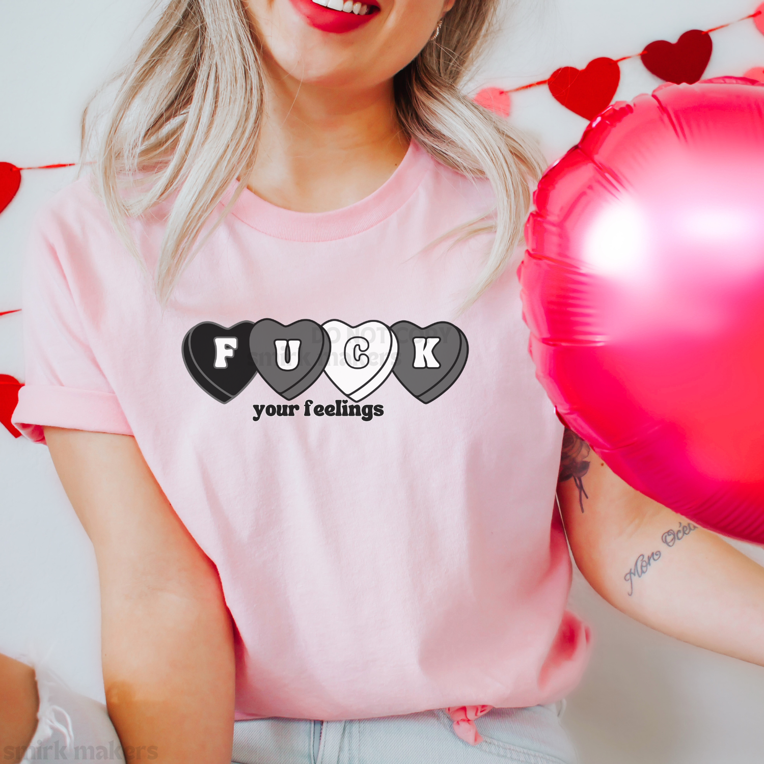 "Fuck your feelings" light pink Valentine's graphic tee.